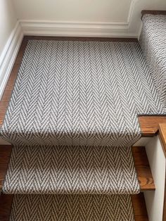 the stairs in this house are made of wood and carpet