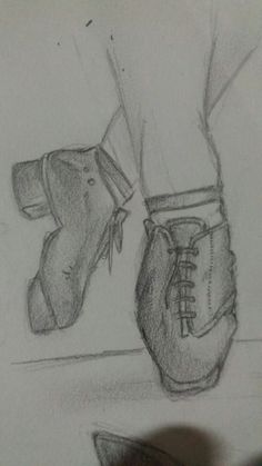 a pencil drawing of a pair of shoes