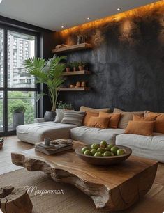 a living room filled with furniture and a large window next to a wooden coffee table