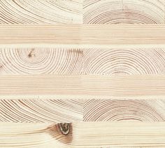 closeup of the wood grains on a wooden flooring board, with an interesting pattern