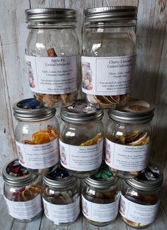 several jars filled with different types of food