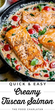 creamy garlic tuscan salmon with tomatoes and spinach in a skillet