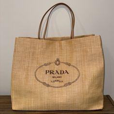 Xl Beach Tote. Largest Size Available. Raffia Tote With Leather Straps And Prada Logo. Never Used. One Of A Kind! Cannot Be Purchased Anywhere In The World! Exclusive Shopping Bag Provided Only In St Barthelemy Or Capri, Italy. Prada Nylon Tote, Prada Raffia, Prada Leather Tote, Boho Decoration, Prada Tote Bag, St Barths, Vintage Tote Bag, Large Leather Tote Bag, Beach Tote Bag