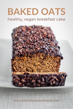 a loaf of baked oats on a plate with the words healthy, vegan breakfast cake