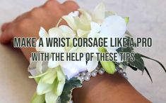 a woman's wrist with white flowers and pearls on it, text reads make a wrist corsage like a pro with the help of these tips