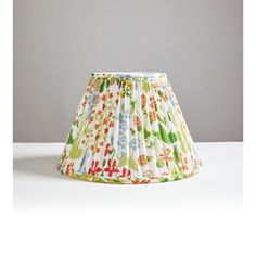 a lamp shade sitting on top of a table