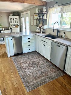 the kitchen is clean and ready for us to use in its new owner's home