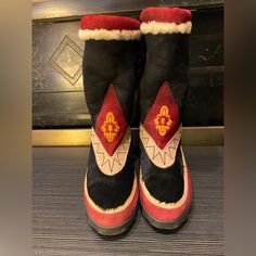 Very Good Condition Made In Italy Cozy Winter Boots. Very Rare & Unique!! Tassel On Back. Traditional Black Boots With Leather Sole, Red Embroidered Winter Boots, Traditional Black Leather Boots, Winter Leather Boots With Embroidery, Traditional Closed Toe Boots With Leather Sole, Winter Embroidered Leather Boots, Traditional Winter Boots, Traditional Black Embroidered Boots, Cozy Winter Boots