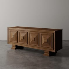 the sideboard is made out of wood and has geometric designs on it's sides