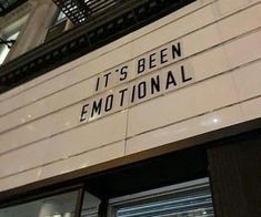 a sign that says it's been emotionally on the side of a theater building