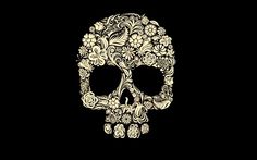 a skull with flowers on it's head in the middle of a black background