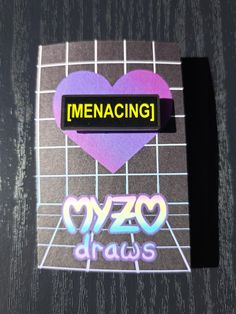 a sticker with the words menacing and a purple heart on it's side