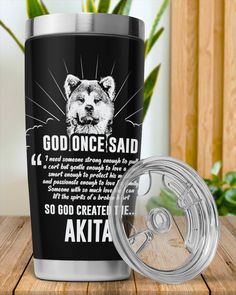 a stainless steel tumbler with the words god once said and an image of a bear