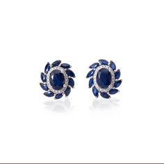 Enhance your look with our elegant Blue Sapphire and Diamond Stud Earrings. Featuring vibrant blue sapphires paired with brilliant round diamonds, these earrings offer a striking balance of color and sparkle. Diamonds Direct, Diamond Stud Earrings, Fine Jewelry Designers, Diamond Stud, Mens Jewelry Bracelet, Engagement Ring Wedding Band, Diamond Pendant Necklace, Vibrant Blue, Diamond Bracelets