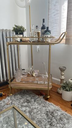 drinks trolley , drinks cart , liquor , glassware Trolley Bar Decor, Drinks Trolley Aesthetic, Liquor Trolley, Alcohol Trolley, Bar Cart Inspo Gold, Gold Drinks Trolley, Shared Home Office, Girly Drinks, Gold Drinks