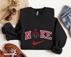 Cute Spiderman Disney Nike Embroidered Sweatshirt: Perfect Valentines Day Gift Spiderman Nike, Spiderman Crewneck, Nike Spiderman, Cute Spiderman, Nike Embroidered Sweatshirt, Disney Nike, Man Embroidery, Matching Hoodies, Embroidered Shirts