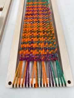 the weaving is being worked on by someone