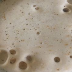 the food is being cooked in the pan on the stove burners and brown spots