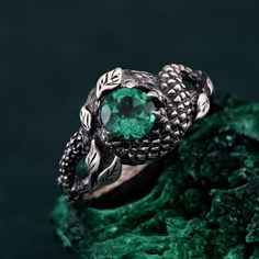 🌟 Warm Greetings, Jewelry Enthusiasts! 🌟 Step into a world where elegance meets personalization with our handcrafted silver rings. Each piece is a testament to unique artistry, blending mystical charm with modern finesse. Our collection offers a special touch for those who adore distinctive and thoughtfully designed jewelry. 🌈 Customization at Your Fingertips: Choose your perfect ring size and select from a variety of enchanting gemstones using our user-friendly dropdown menus. We delight in offering you the chance to create a ring that resonates with your personal style and story. ✨ Design It Your Way: Dreaming of a specific look? We're here to make it happen! Whether it's altering dimensions, adding extra gemstones, or choosing a different material, reach out to us. Your imagination i Sterling Silver Fantasy Ring, Green Snake Ring Gift, Green Snake Ring For Gift, Handmade Emerald Spiritual Rings, Handmade Spiritual Emerald Ring, Nature-inspired Emerald Rings For Gift, Mystical Green Rings Perfect For Gifts, Unique Emerald Ring As A Gift, Unique Emerald Ring For Promise