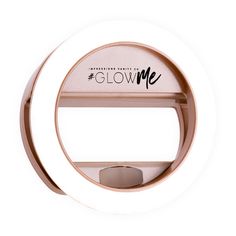 a round mirror with the words glow me on it's front and back sides