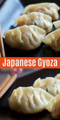 some dumplings are sitting on a plate with chopsticks in front of them