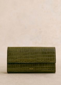 Hand-held;Made in our Italian atelier ;Smooth crocodile-embossed leather exterior;Leather lining;Press stud fastening;Zipped pocket and patch pocket inside;Weight: 360 g / 12.7 in;Dimensions: 14 x 24.5 x 4.5 cm / 5.5 x 9.6 x 1.8 in Lifestyle Dresses, Denim Suit, Basket Bag, Best Bags, Small Leather Goods, Parisian Style, Pistachio, Embossed Leather, Small Bags