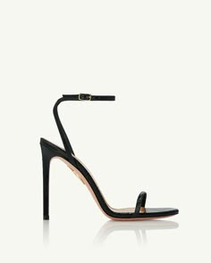 A minimalist masterpiece: our Olie Sandals work with just about anything in your wardrobe. The sleek, barely-there silhouette is crafted from black leather with a snakeskin texture that subtly catches the eye, while remaining understated. The razor-sharp 105 mm heels add a hint of rebellion. Date Night Shoes, Night Shoes, Wedding Guest Bags, Woman Heels, Haute Couture Looks, Luxury Sandals, Hair Cosmetics, Corporate Fashion