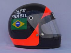 a helmet with the words cafe do brasil on it is shown in front of a blue background