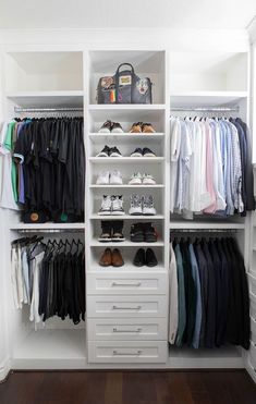 an organized closet with white shelves and drawers