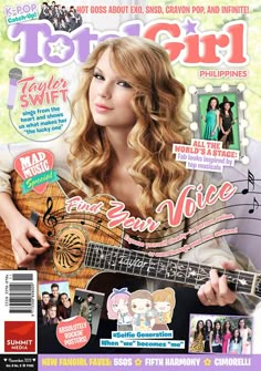 a magazine cover with a woman holding a guitar