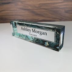 a box with a name tag on it sitting on a table