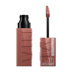 Descubre el nuevo labial líquido SuperStay Vinyl Ink de Maybelline. Le da a tus labios un acabado tipo vinilo que no se corre y dura hasta 16 horas. Este lipstick de larga duración tiene una fórmula que desafía las manchas y transferencia. Además proporciona un brillo instantáneo al terminar la aplicación. ¡Disponible en 10 tonos! Agita por al menos 5 segundos antes de aplicarlo. Aplícalo como lo harías normalmente y déjalo secar por completo. Maybelline Super Stay Vinyl Ink, Maybelline Superstay Vinyl Ink, Superstay Maybelline, Maybelline Lipstick, Vegan Art, Alat Makeup, Maybelline Superstay, Maybelline Makeup, Long Wear Lipstick