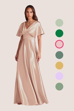 a woman in a long dress standing next to color swatches and the colors below her