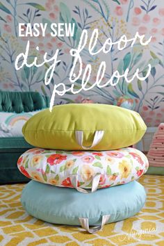 four pillows stacked on top of each other with the words easy sew floor pillow