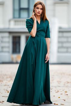 "Dark Green Maxi Dress, New Year Maxi Dress, Cocktail Party Dress Classic dark green maxi dress with circle skirts ➤ Features > dress lenght: 150 cm / 59,05\" > mid sleeves > v neckline > circle skirts > waistband ➤ Sizing My Size Guide in FAQ section below will help you define the perfect size match. The item can also be made according to your measurements - just message them to me. ➤ Delivery Your item is made-to-order and will be ready within 2-7 days. Average delivery times: & Elegant Green Embroidered Maxi Dress, Elegant Flowy Green Maxi Dress, Green Flowy Floor-length Midi Dress, Flowy Green Floor-length Midi Dress, Elegant Dark Green Maxi Dress For Spring, Spring Dark Green A-line Dress, Green Bohemian V-neck Wrap Dress, Fitted Green Chiffon Maxi Dress, Green Fitted Maxi Dress