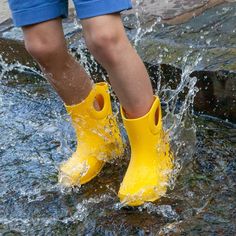 Your kiddos will stay dry while puddle jumping on a gloomy day in these bright yellow toddler rain boots. These durable and comfortable boots are easy for kids to put on by themselves. After your adventures, these kids' boots can easily be washed and disinfected. Seamless construction keeps feet dry. Pull loops on each side make them easy to pull on. Shaft circumference is approximately 11 inches, and shaft height is approximately 6.5 inches. Slip-resistant and non-marking sole. Waterproof and m Green Rain Boots, Turquoise Sandals, Puddle Jumping, Boys Rain Boots, Girls Rain Boots, Toddler Rain Boots, Camping Shoes, Kids Rain Boots, Kids Rain