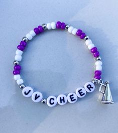 Cheer Bracelets  Create the perfect stack for you and your squad!  Customize with team colors, team name and megaphone 📣 *Please add colors and name in personalization section* CARING TIPS FOR YOUR JEWELRY ⭐️Treat and store with care. ⭐️ For longevity, avoid exposing your jewelry to water. ⭐️ Avoid having direct contact with lotions, perfumes, sanitizers as these chemicals may cause discoloration of your jewelry. White School Spirit Jewelry As A Gift, White School Spirit Jewelry As Gift, School Spirit White Jewelry As Gift, White School Spirit Jewelry Gift, Adjustable White Bracelets For Team Events, Cheer Bracelets, Cheer Bracelet, Cheer Jewelry, Team Bracelets