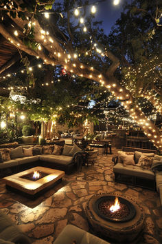 Magical Patio Lighting Ideas depicting a spacious patio with comfortable seating and numerous string lights creating a fairy-tale-like atmosphere. Fairy Lights Backyard Party, Lit Up Backyard, Outdoor Patio Ideas Restaurant, Fairy Tale Garden Ideas, Outside Oasis Backyards, Garden With Fairy Lights, Vintage Backyard Ideas, Back Garden Patio Ideas, Whimsical Patio Ideas