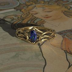 This Art Nouveau Moon themed engagement ring is made from recycled gold and is handmade with a comfort fit to your size. Perfect for the nature lover.  To see our entire Celestial collection, click here: https://www.etsy.com/shop/MetalWendler?ref=seller-platform-mcnav&section_id=50265844 To see variations on this design, click here: https://www.etsy.com/shop/MetalWendler?ref=seller-platform-mcnav&search_query=marquise+moon Ring Specs: ● 7x3.5mm Marquise Lab Sapphire, ~0.48ct (Cut weight varies slightly). ● Metals: Silver or gold. This ring is available with different metals, message me about your idea.  ● Widest point of ring is 9.2mm at the top, and tapers down to about 1.8mm at the back.  ● Sizing: It is important for gold that you provide your EXACT finger size. Each ring is handmade to Art Noveau Ring, Art Nouveau Wedding Ring, Fantasy Rings Engagement, Celestial Wedding Ring, Fantasy Wedding Rings, Moon Engagement Ring, Engagement Ring Marquise Cut, Engagement Ring Marquise, Fantasy Ring