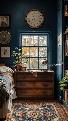 a bedroom with blue walls and a large clock on the wall next to a bed