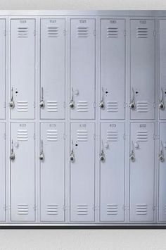 a bunch of lockers are lined up against the wall