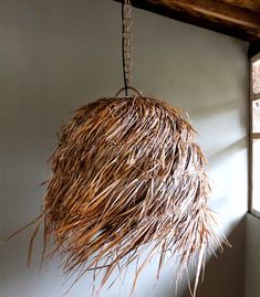 a light fixture hanging from the ceiling in a room