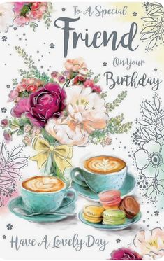 a birthday card with two cups of coffee and flowers