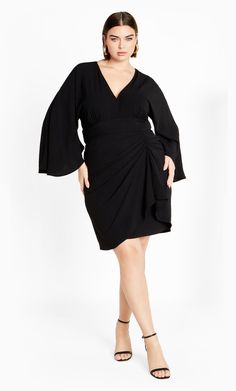 Add a bold touch to your wardrobe that is a breeze to flaunt. Say hello to our Malani Dress. Utterly chic, this dress features full length flare sleeves, a waist definition and a gathered hip detail for a flattering finish. Key Features Include: - V-Neckline - Back hook and zip closure - Full length flare sleeves - Waist definition - Gathered hip detail - Lined - Mini length Accessorize with silver jewelry for a subtle glam style. | Plus Size Malani Dress in Black, Size 24 | City Chic Subtle Glam, Dresses Date Night, Flare Sleeves, Glam Style, Date Night Dresses, Under Dress, Draped Dress, Glam Fashion, Fit N Flare Dress