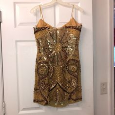 This Fully Gold Crystal Beaded Dress Is Excellent For Any Fancy Cocktail Party Or Holiday Party. The Dress Retails For Over $500 And It Fits Like A Size 4 Although It Is A Size 10. It Falls Above The Knee And Is Very Slimming And Greatly Sparkly !!! You Will Make A Heck Of An Entrance ! Fancy Cocktail Party, Gold Beaded Dress, Evening Cocktail Dress, Sherri Hill Dresses, Cocktail Evening Dresses, Evening Cocktail, Sherri Hill, Gold Crystal, Beaded Dress