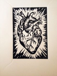 a black and white drawing of a human heart