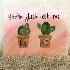 two potted cactuses with the words you're stuck with me on them