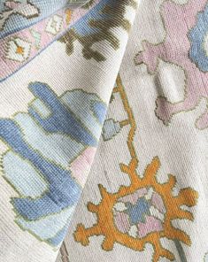 the fabric is very colorful and has an interesting pattern on it's side,