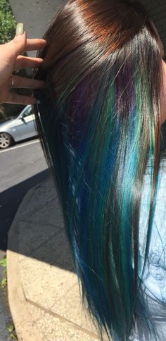 blue blend with hint of purple underneath layer of dark brown Hair With Purple Underneath, Dyed Hair Underneath, Blue Hair Underneath, Purple Underneath Hair, Hair With Purple, Blue Brown Hair, Hair Dyed Underneath, Oil Slick Hair, Hair Stripes