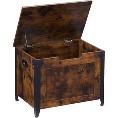 an open wooden chest with metal handles